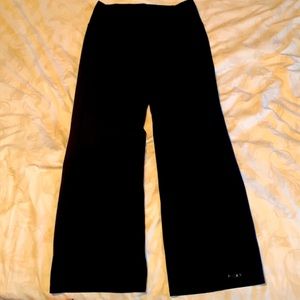 Drynamic athletic pant. Centre seam pull on with back zipped security pocket.